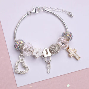 Lauren Hinkley - Cross Charm Bracelet